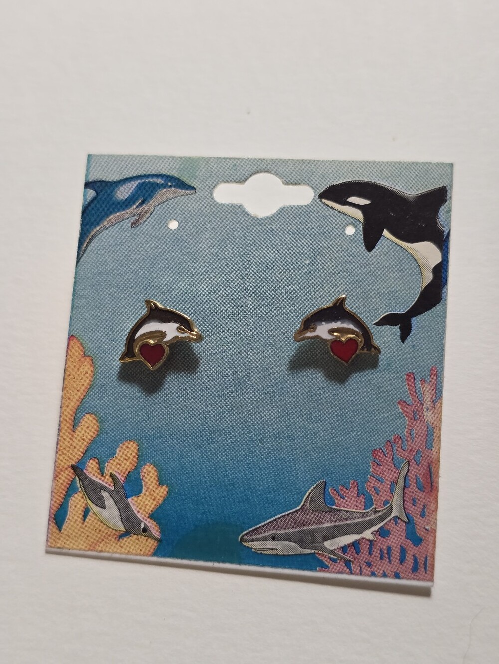 Gold Dolphin Stud Earrings with Red Heart Accent